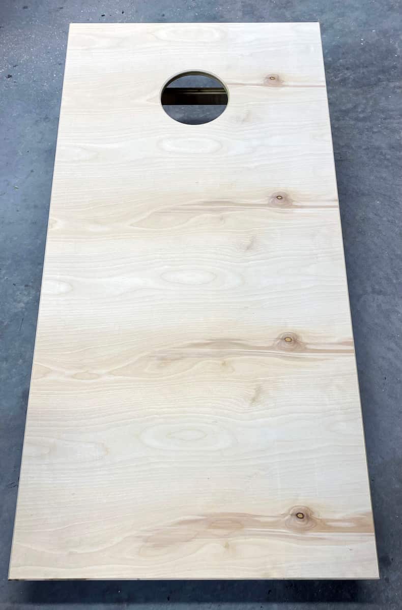 Unfinished assembled cornhole board top ready for finishing